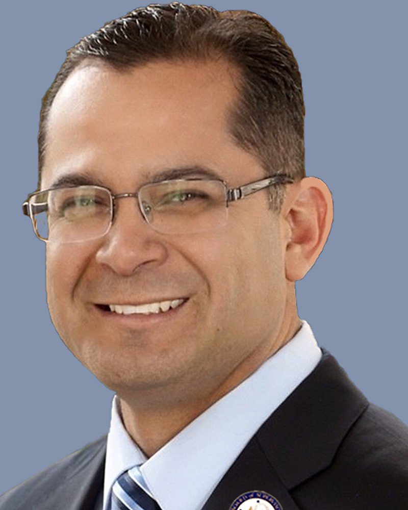Official portrait of V. Manuel "Manny" Perez