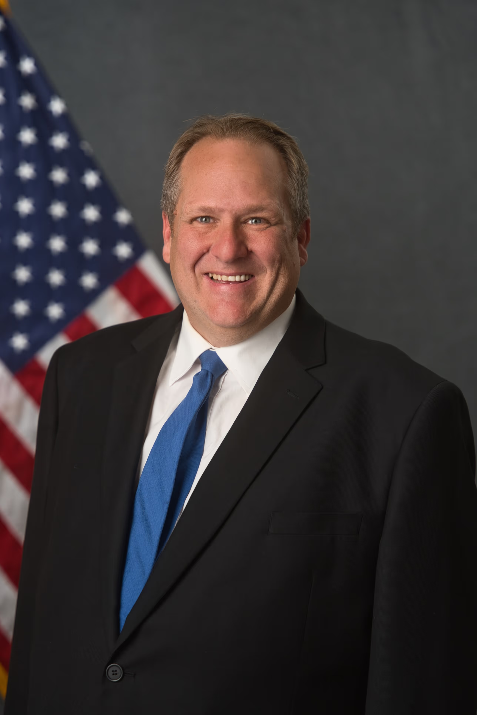 Official portrait of Tom Richins