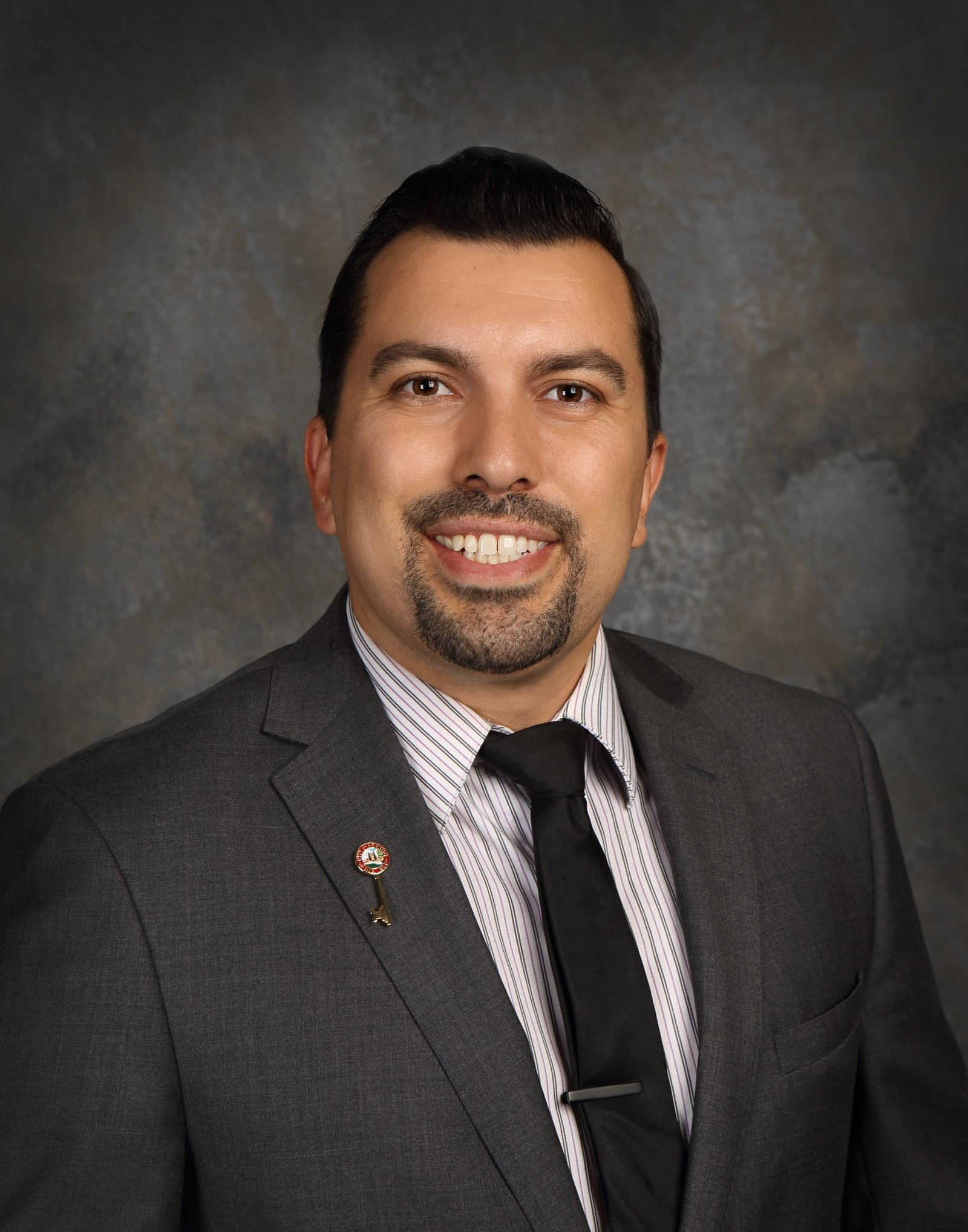 Official portrait of Malcolm Corona